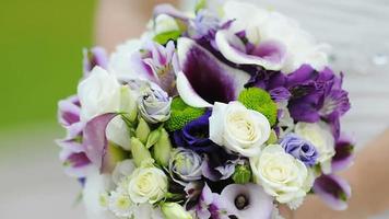 A Bride Holding A Wedding Bouquet video