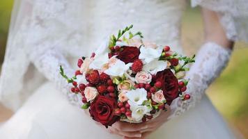 A Bride Holding A Wedding Bouquet video