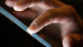 Hands Touching The Screen Of A Tablet video