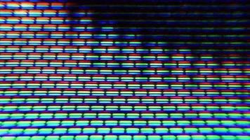 les pixels de l'écran du téléviseur fluctuent avec la couleur et le mouvement de la vidéo video