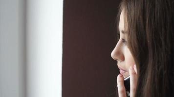 Young Woman Talking On A Mobile Phone video