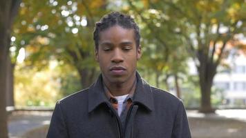 African American Man looking at camera video