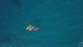 Kayaks in the sea top down view  video