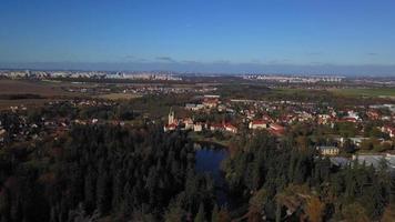 Drone flying towards a chateau in a park in 4K video