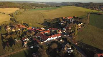 Flying over a village in 4K video