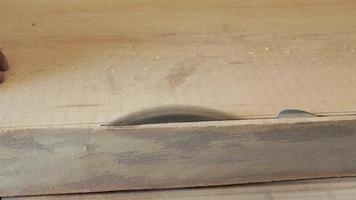 Plank Passing through a Table Saw