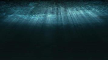 Deep Blue Underwater with Sunlight Rays Shining Through Ocean Surface video