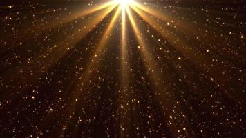 brilhantes raios de luz dourada e partículas video