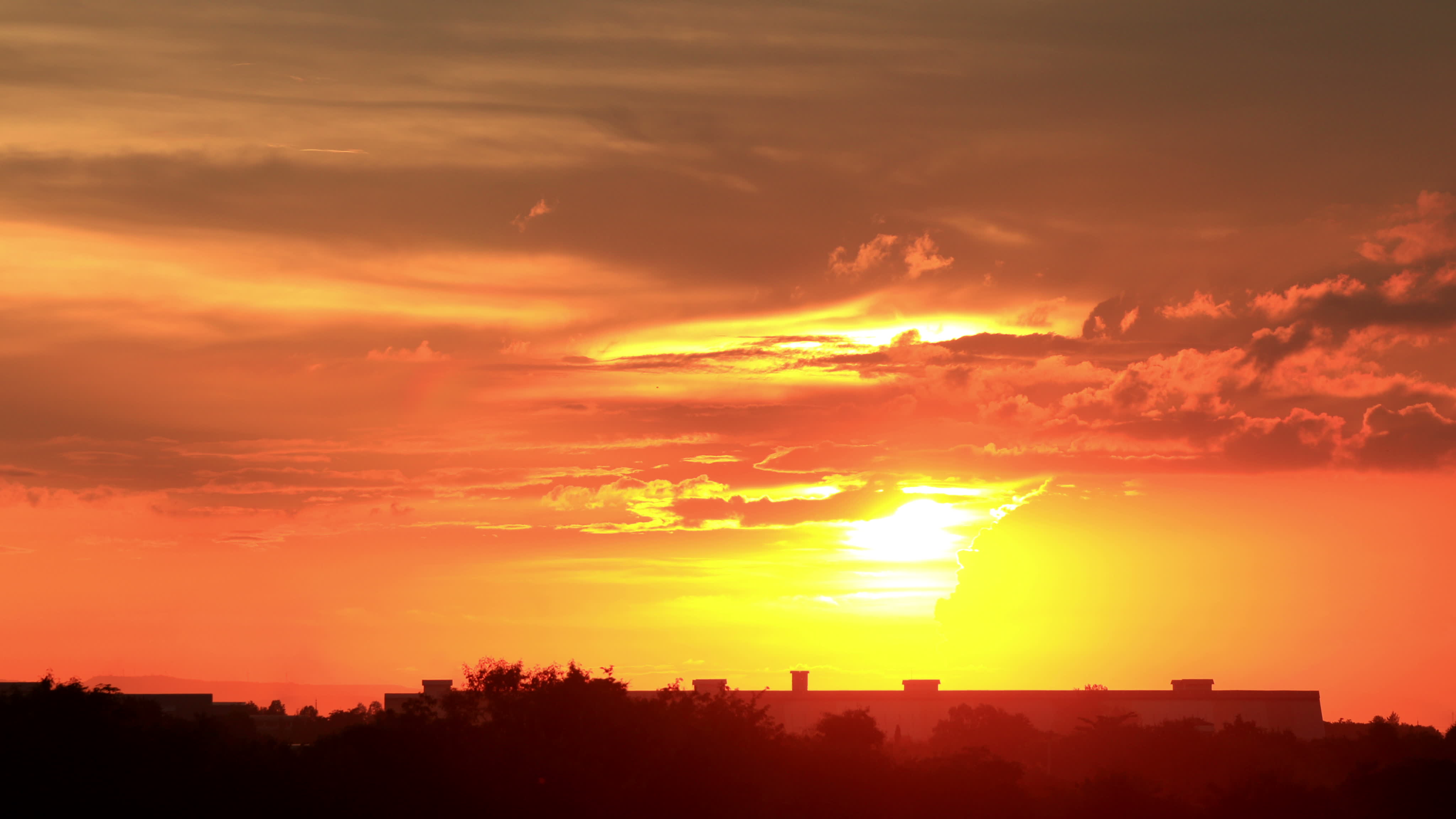 The Red Sun Behind The Clouds 1626937 Stock Video at Vecteezy