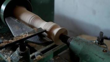 Carpenter Cuts a Part on a Lathe video