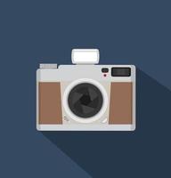 Flat style vintage camera with long shadows vector