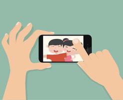 Hand Holds Smartphone and Takes Selfie vector