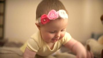 Beautiful baby crawling on the bed video