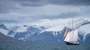 Sailing boat on the water photo