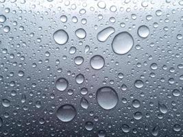 Close-up of water on a translucent surface photo