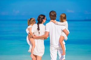 Family looking at the ocean photo