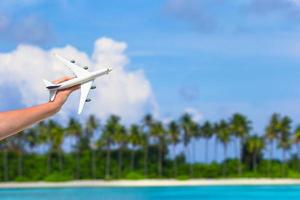 Toy airplane against a blue sky photo