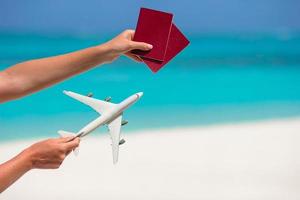 Passports and a toy airplane photo