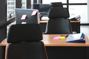 Selective focus of wooden tables and office desks photo