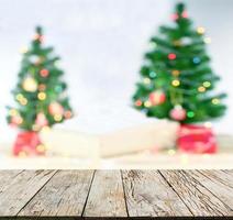 Christmas scene with blurred tree and bokeh lights background photo