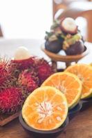 Fruit on a wooden table photo