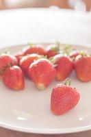Plate of strawberries photo