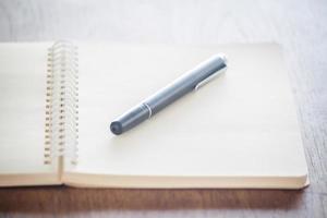 Pen with a notebook photo