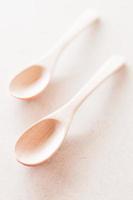Top view of wooden spoons photo
