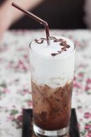Iced mocha with chocolate drizzle photo