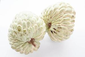 Two custard apples on a white background photo