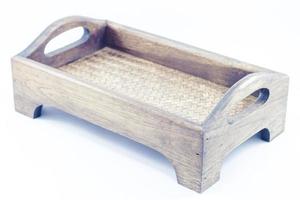 Wooden tray on a white background photo