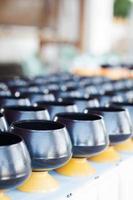 Alms bowls in a temple photo