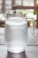 Glass pitcher of water photo