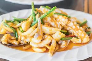 Stir-fried squid with salted eggs photo