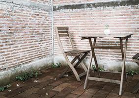 Empty wooden chairs and tables photo