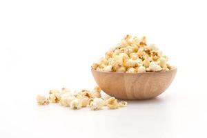 Caramel popcorn on white background photo