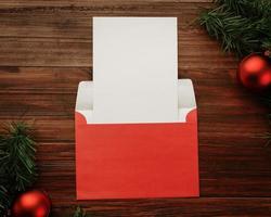 Merry Christmas greeting card and envelope mockup photo