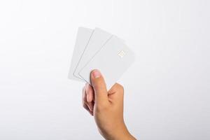 Close-up of woman's hand holding blank card photo