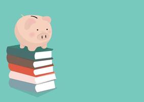 Piggy bank resting on a stack of books vector