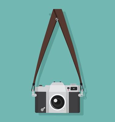 Vintage photography camera hanging on a strap