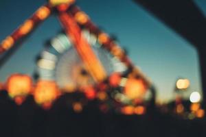 Blurred Ferris wheel at night photo