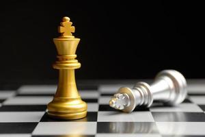 Gold and silver chess pieces photo