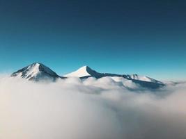 Mountains covered with fog photo