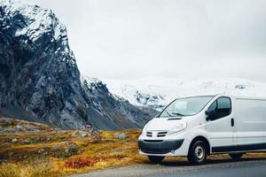 White van parked near mountains photo