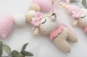 Pink and white bear plush toy photo