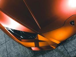 Kish Island, Iran, 2020 - Top view of an orange Lamborghini Aventador Coupe photo