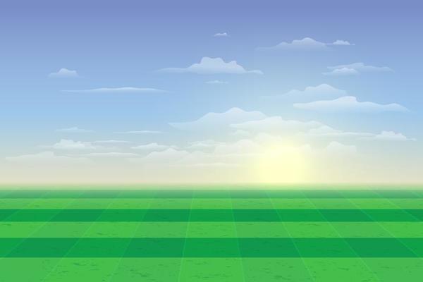 Green field with blue sky and clouds background