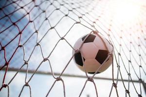 Soccer ball soars into goal net