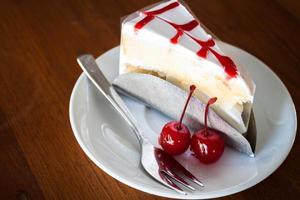 Close-up of a cake with cherry sauce photo