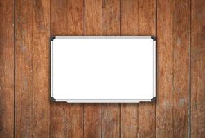 White board on an old wooden background photo